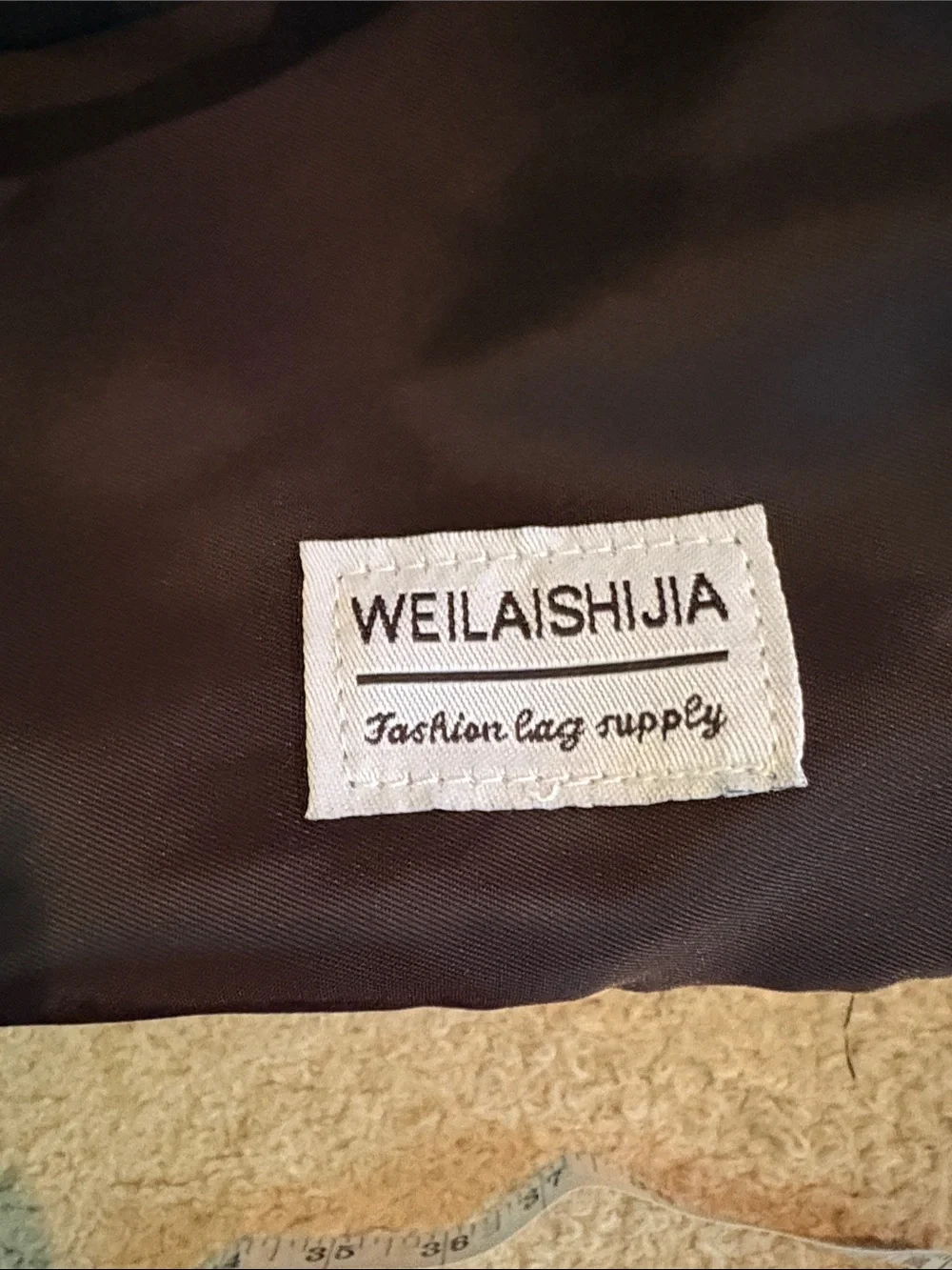 weilaishijia black duffel